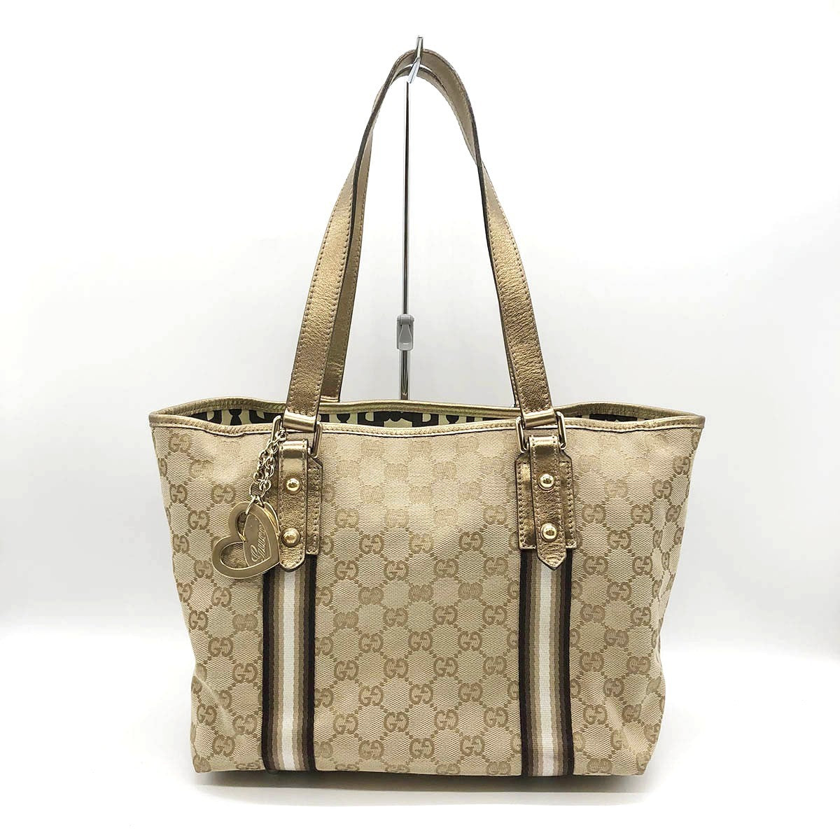 Gucci 137396 Tote Bag in GG Canvas with Heart Charm, Brown and Gold