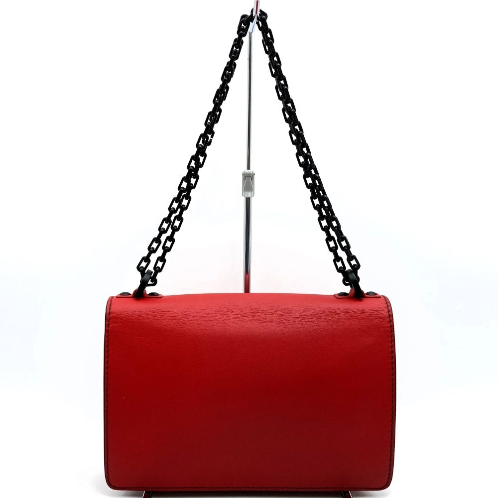 Dior J'Adore chain shoulder bag in red/black leather. Maria Grazia Chiuri
