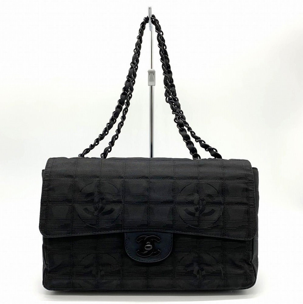 Excellent condition CHANEL New Travel Line Chocolate Bar Chain Shoulder Bag, Nylon, Coco Black.