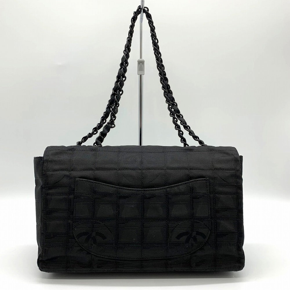 Excellent condition CHANEL New Travel Line Chocolate Bar Chain Shoulder Bag, Nylon, Coco Black.