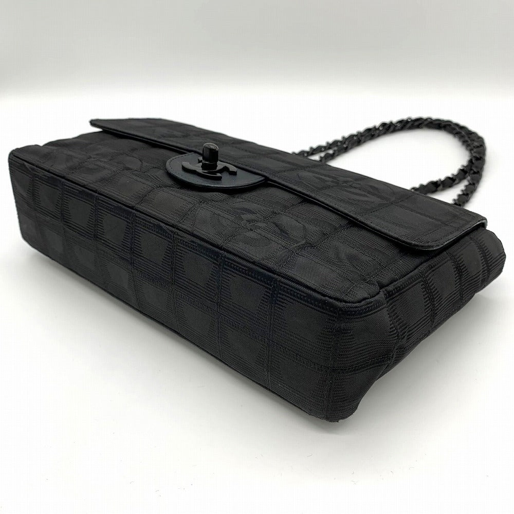 Excellent condition CHANEL New Travel Line Chocolate Bar Chain Shoulder Bag, Nylon, Coco Black.