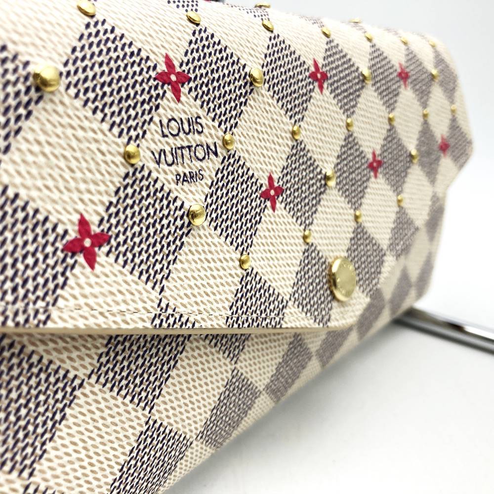 Louis Vuitton Portefeuille Sarah N45296, a cute bifold long wallet with flower studs, made of Damier Azur canvas in beige/pink.