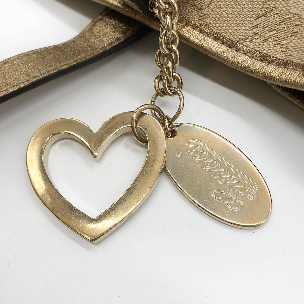 Gucci 137396 Tote Bag in GG Canvas with Heart Charm, Brown and Gold