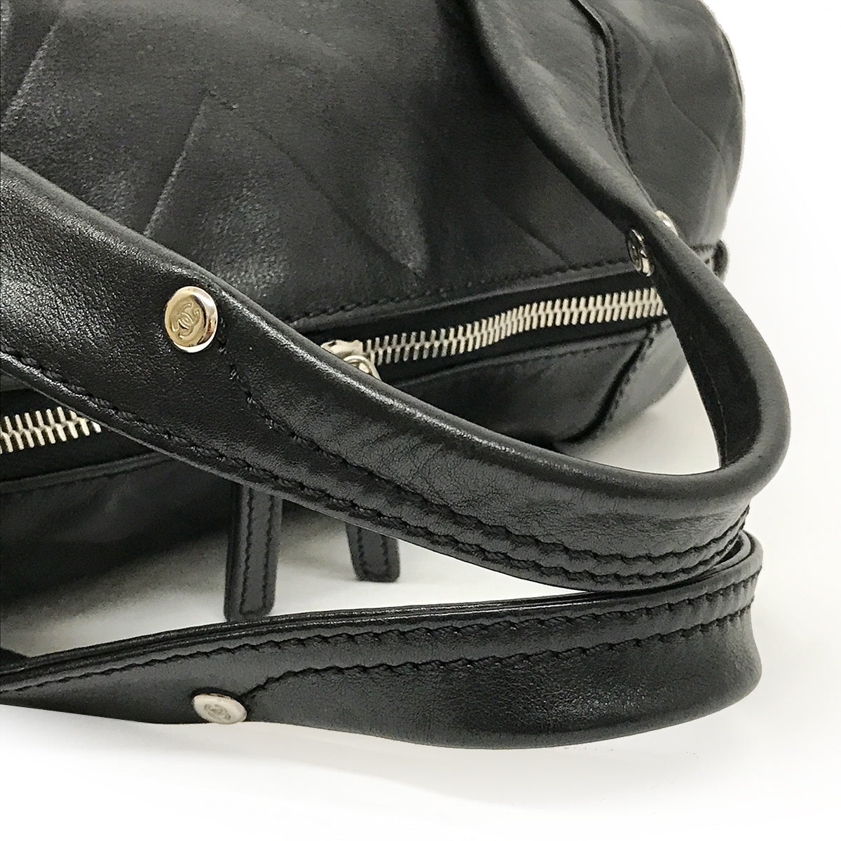 Used Chanel Mini Boston Handbag with Chevron and Coco Mark in Black Leather