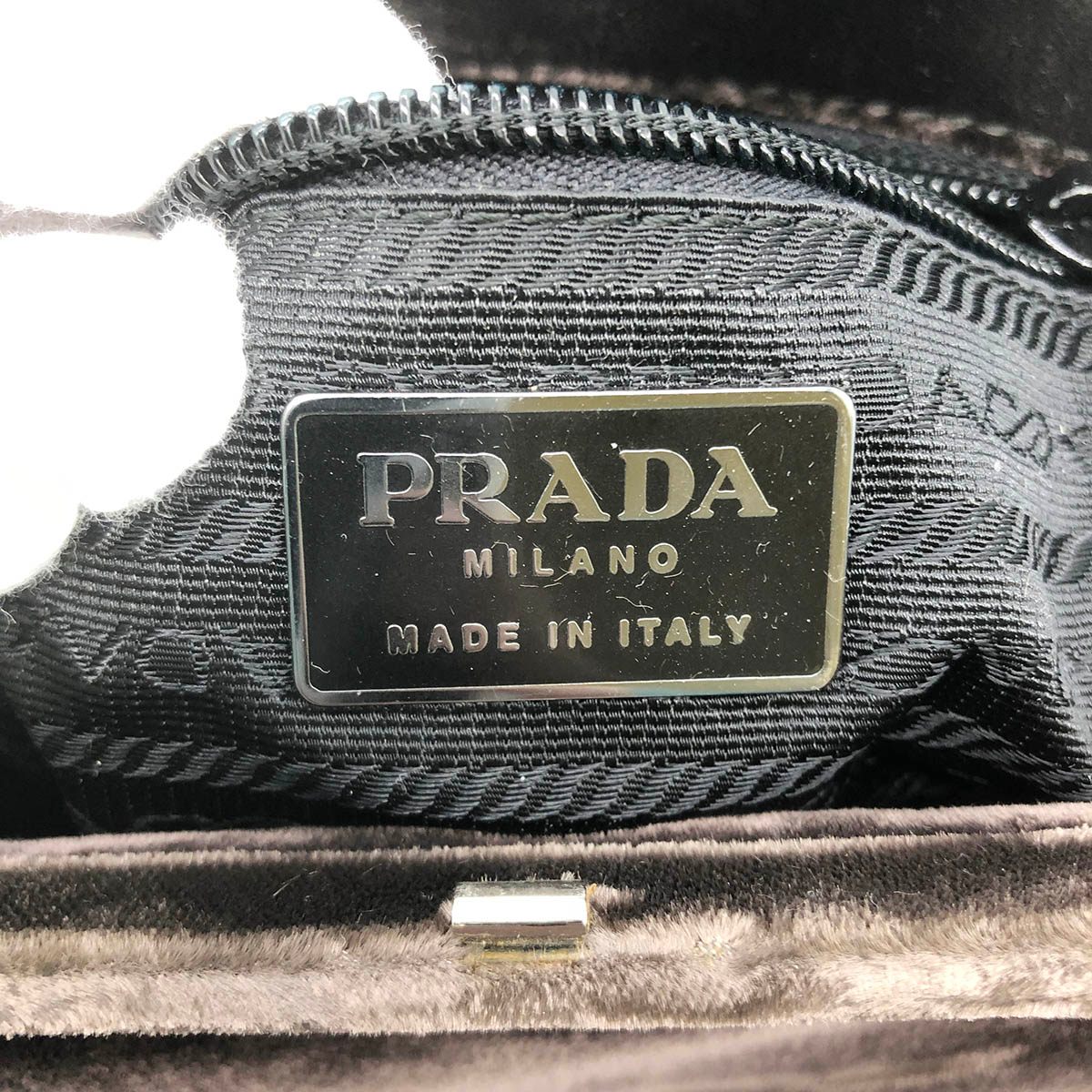 Prada handbag, brown velour with clasp closure