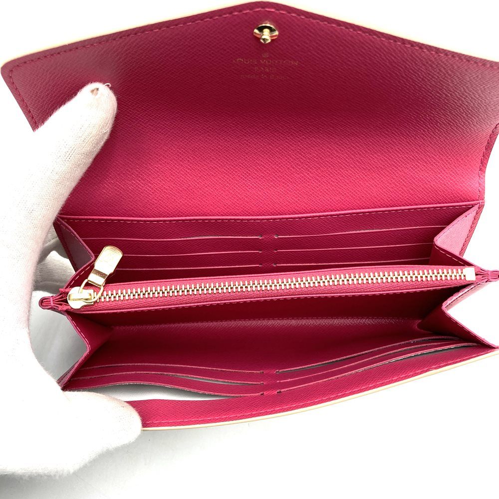 Louis Vuitton Portefeuille Sarah N45296, a cute bifold long wallet with flower studs, made of Damier Azur canvas in beige/pink.