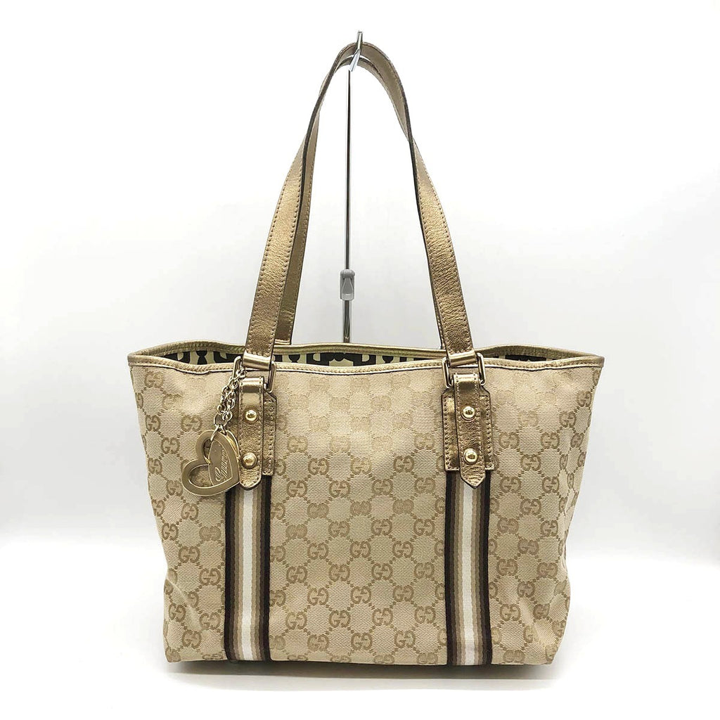 Gucci 137396 Tote Bag in GG Canvas with Heart Charm, Brown and Gold