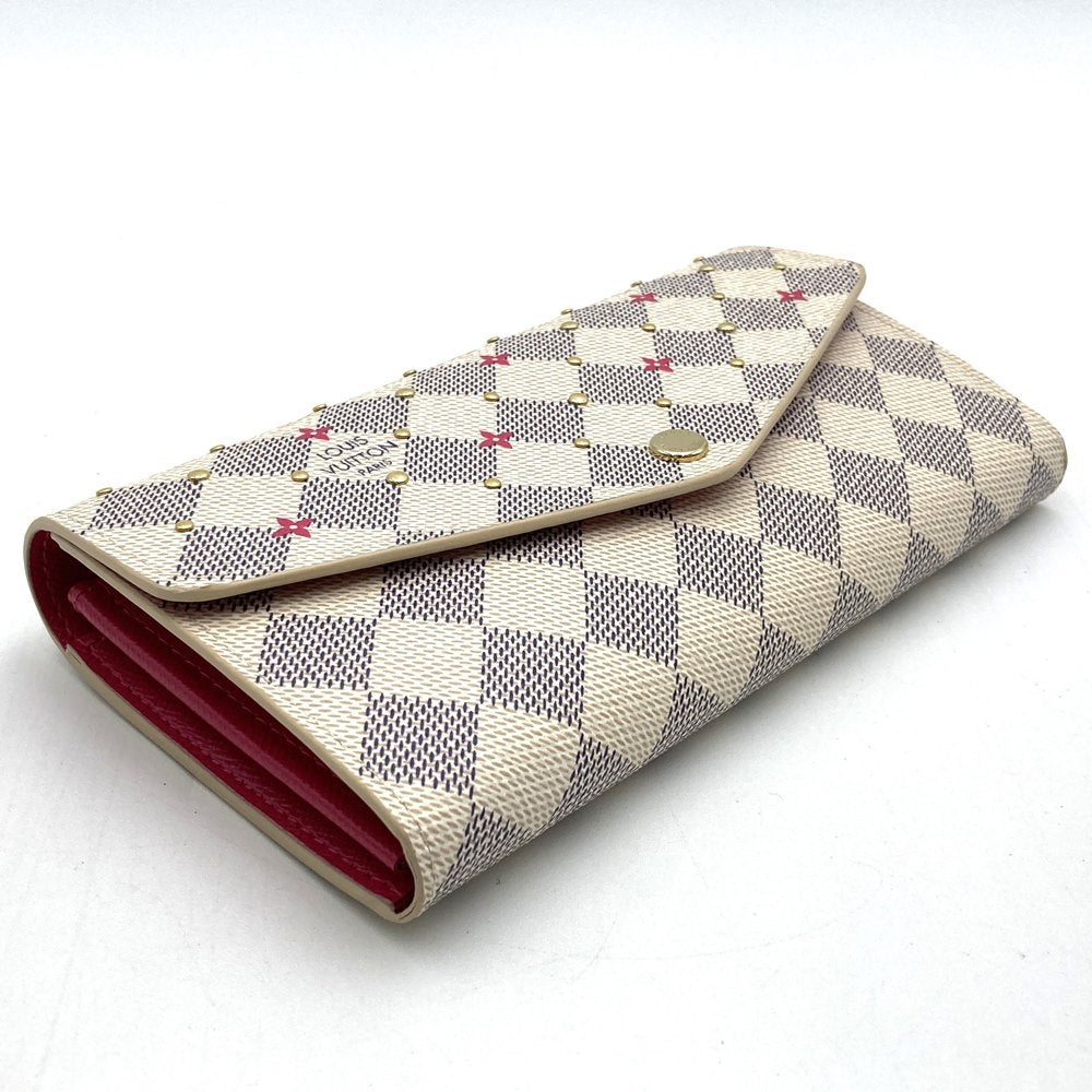 Louis Vuitton Portefeuille Sarah N45296, a cute bifold long wallet with flower studs, made of Damier Azur canvas in beige/pink.